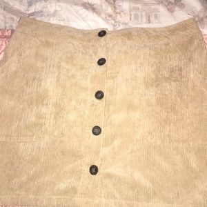 Skirt soft ish with buttons and pockets